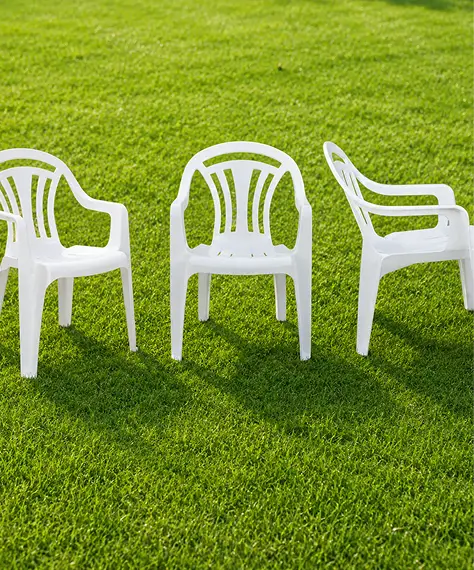 Stackable White Plastic Low Back Chairs for Indoor Dining, Patio & Garden Seating